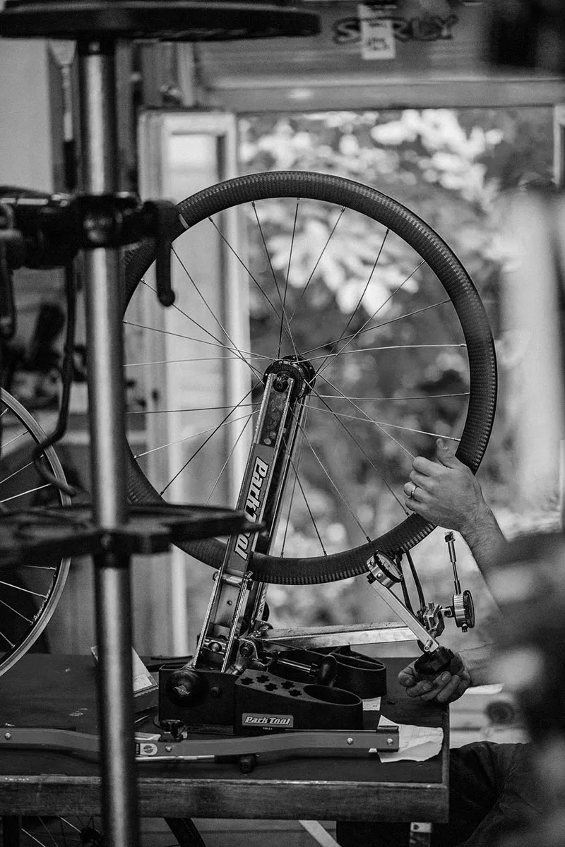 mechanic truing a wheel-1